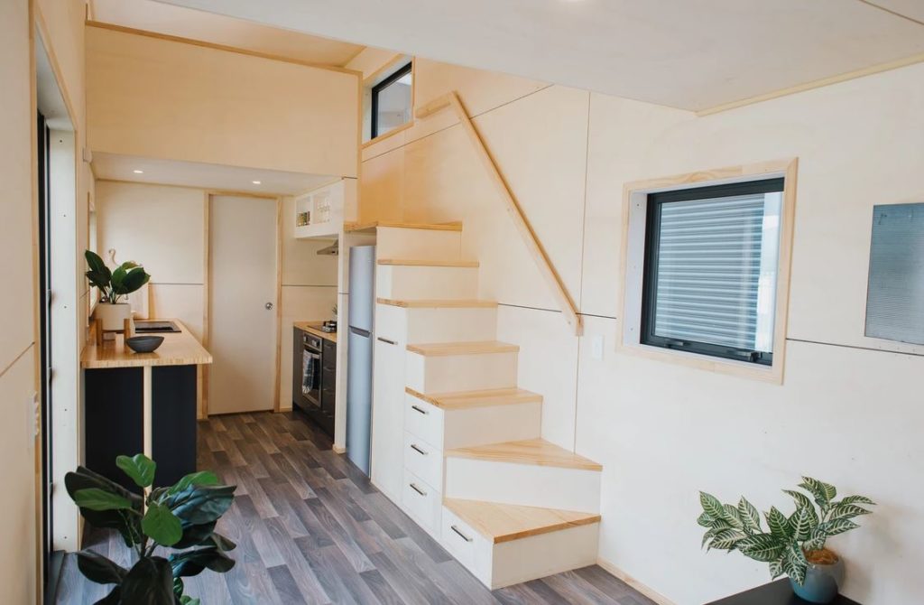 This Tiny House Has Two Staircases with Storage Integrated