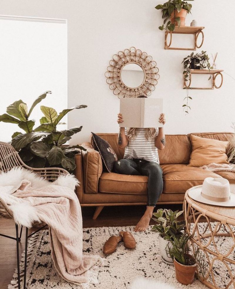 Earthy boho decor with brown couch