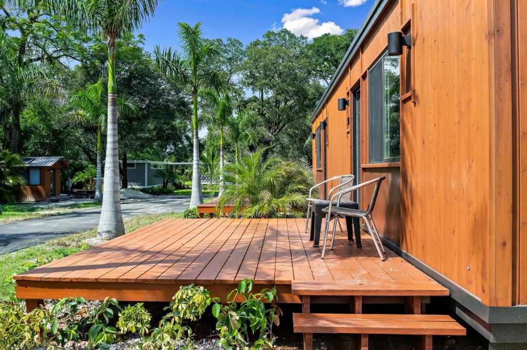 Palm trees line the streets at Escape Tiny House community in Tampa Bay